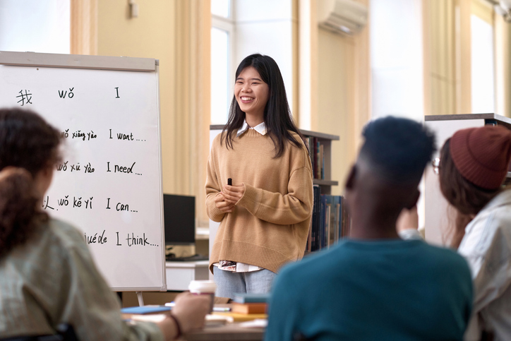 Asian woman teaching language