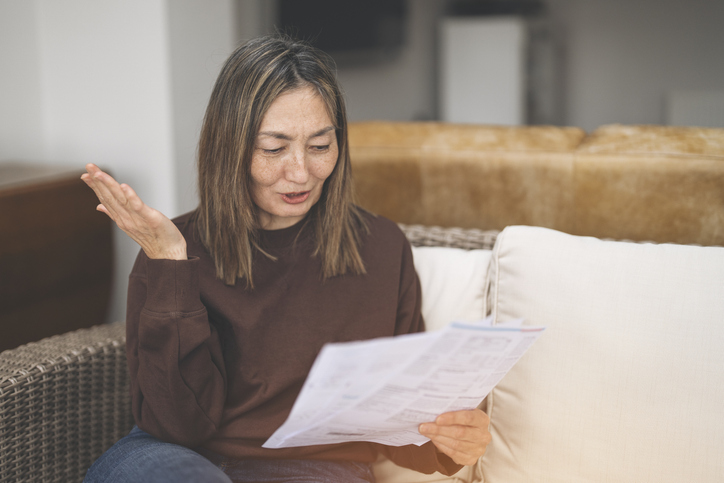 Woman holding paperwork